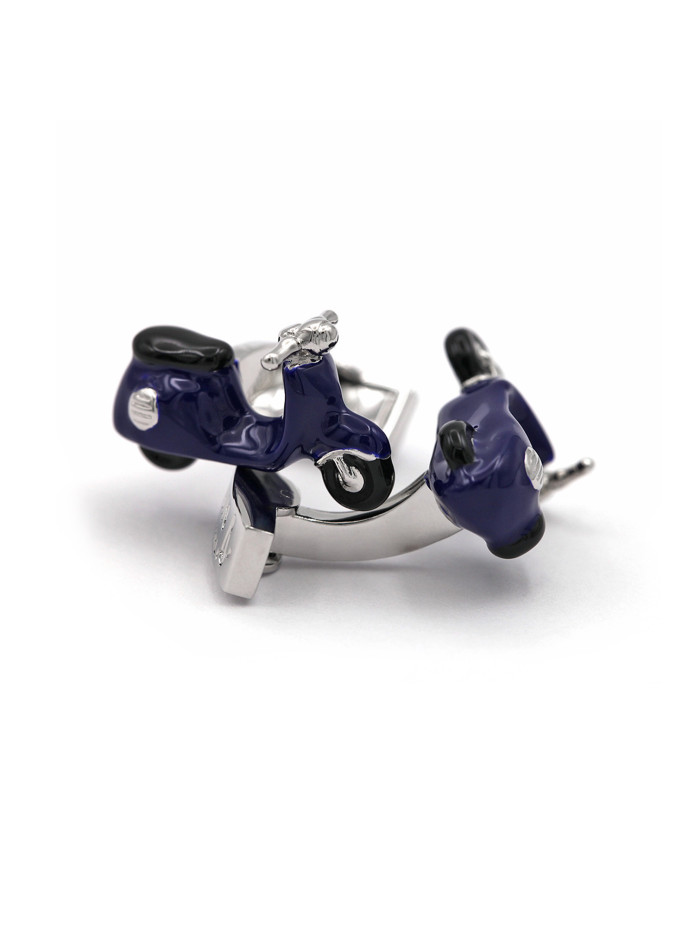 botón de puño azul con diseño de scooter