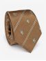 Corbata de seda beige con motivos de blasones