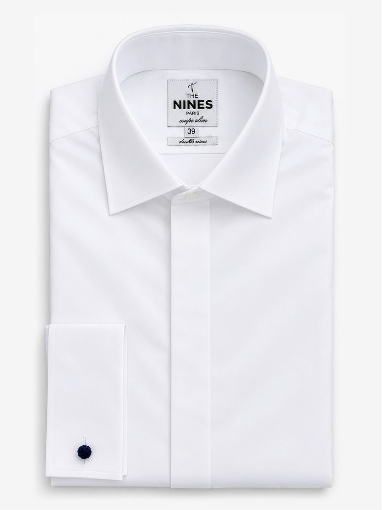 Camisa blanca con puños para gemelos y tapeta oculta cuello italiano
