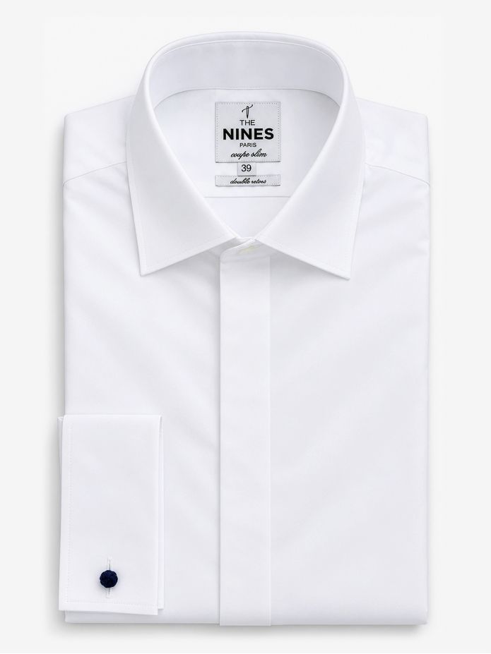Camisa blanca con puños para gemelos y tapeta oculta cuello italiano